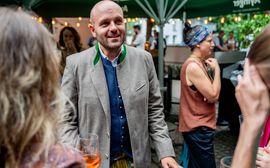 Summer festival at Platzl Hotel with happy guests enjoying the event, creating a cheerful and lively atmosphere